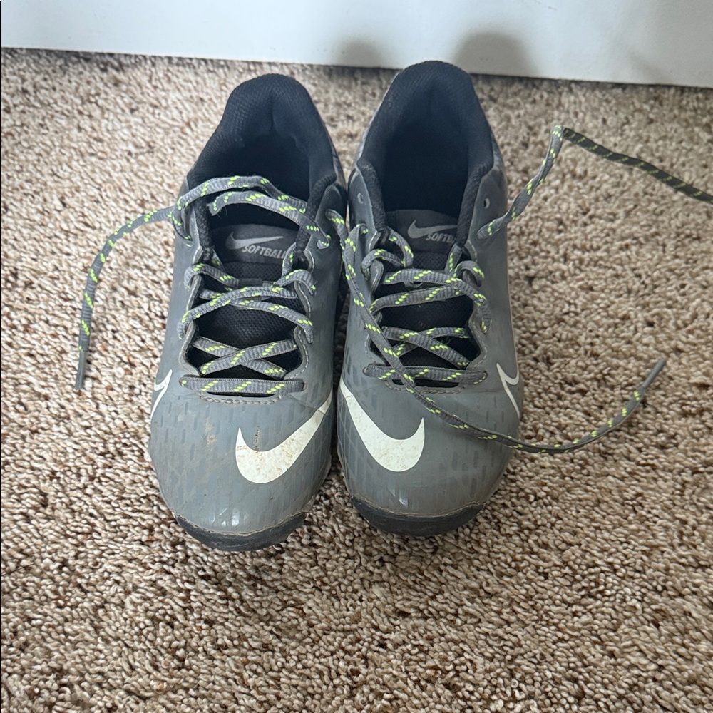 Nike Gray cleats with White and Green Accents